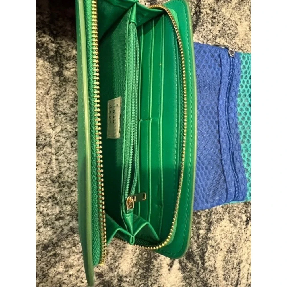 A New Day Green Zip Around Continental Wallet Wristlet‎ and a blue/teal pouch